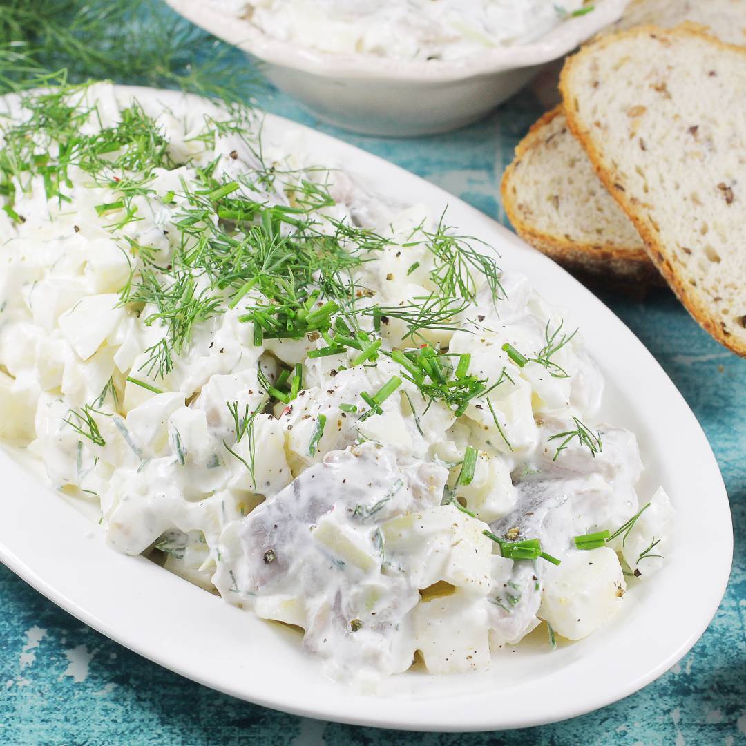 Śledź w śmietanie z jabłkiem (500g)